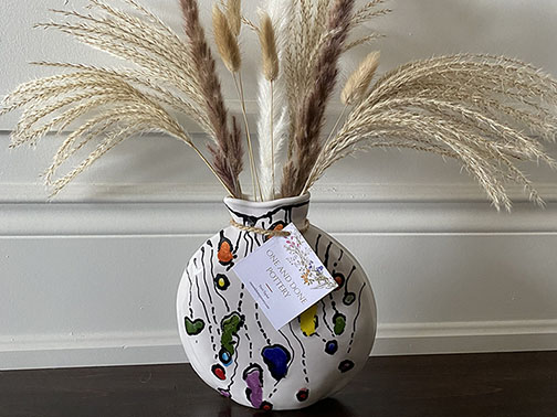Beautiful Planter - Elegant ceramic planter with artistic flair