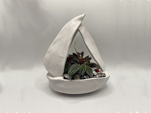 Come Sail Away - Ceramic sailboat capturing dreams and adventure