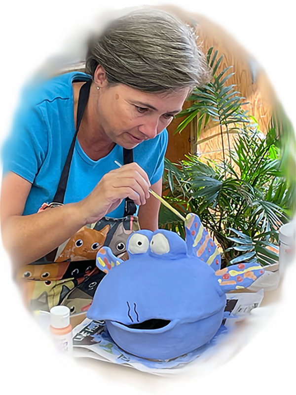 Terri Taylor working on a ceramic piece in her studio